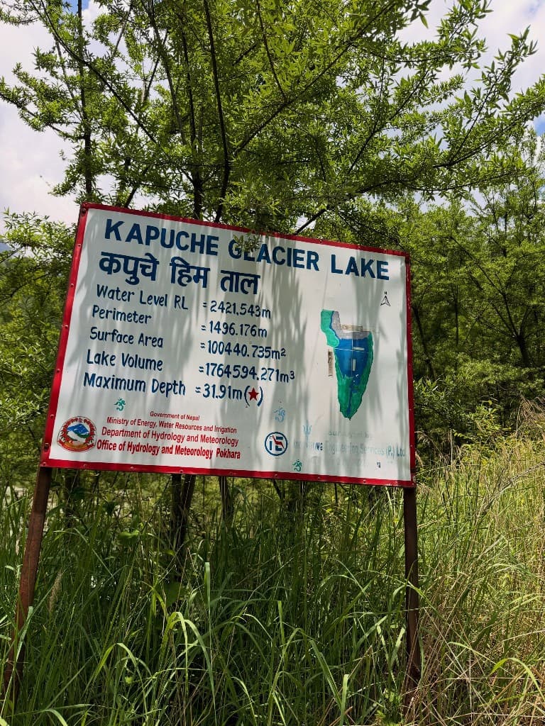 Official hydrology information sign at Kapuche Glacier Lake