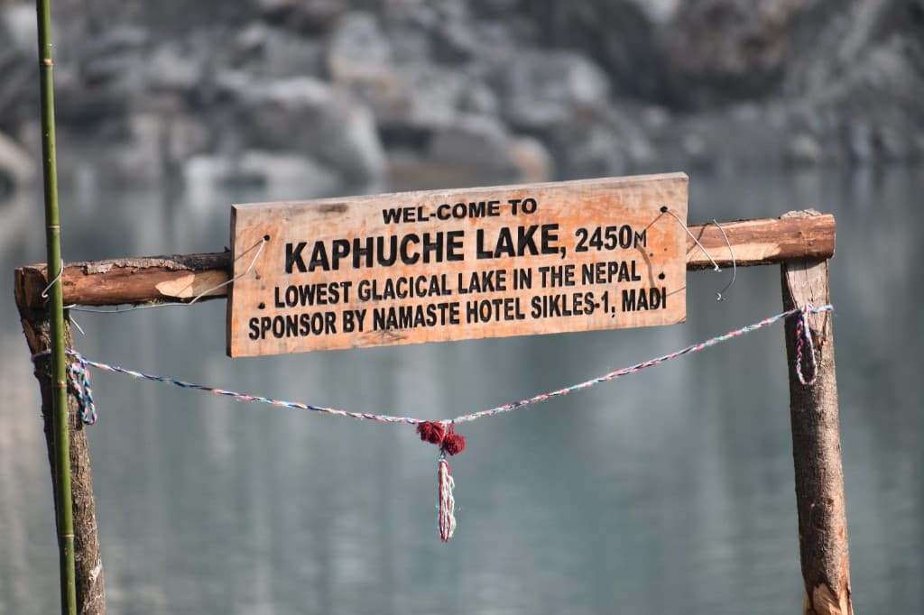 Welcome sign at Kapuche Lake — lowest glacial lake in Nepal