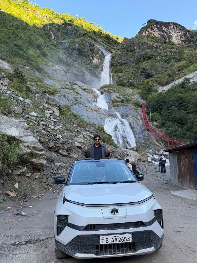 Punch EV at Rupse Waterfall with sunroof pose