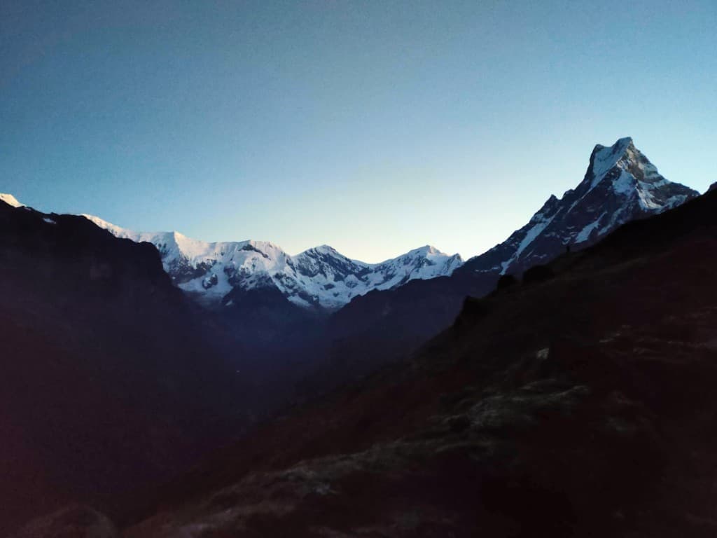 Sunrise over Machhapuchhre and Annapurna South from Mardi Himal Base Camp