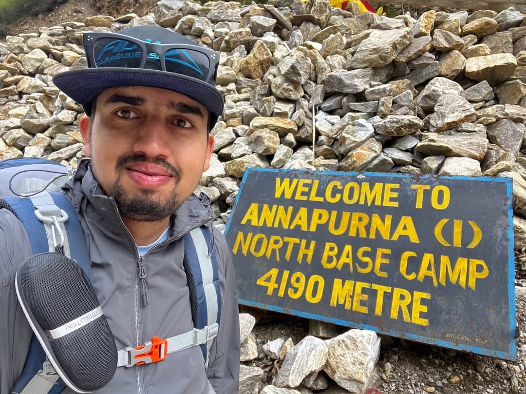 Pratap at the Annapurna I North Base Camp 4190 m welcome sign
